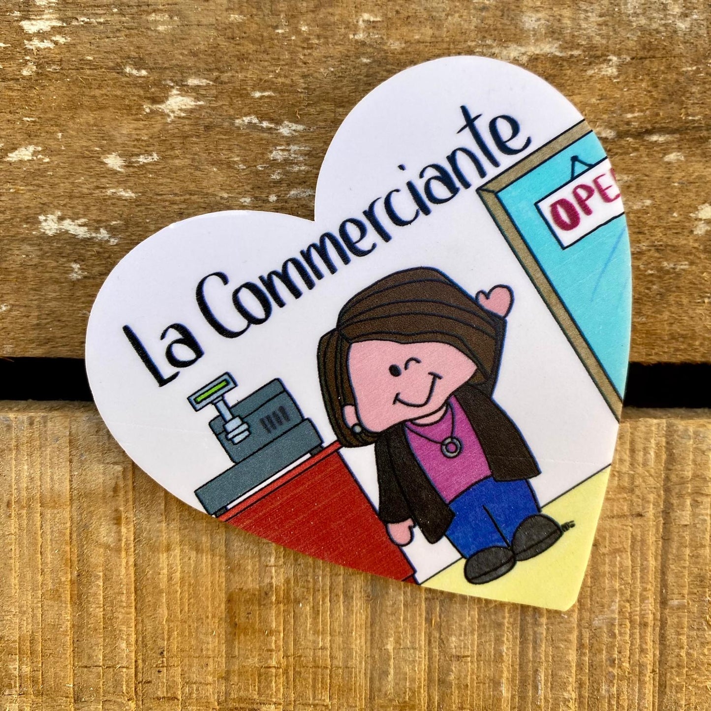 LA COMMERCIANTE
